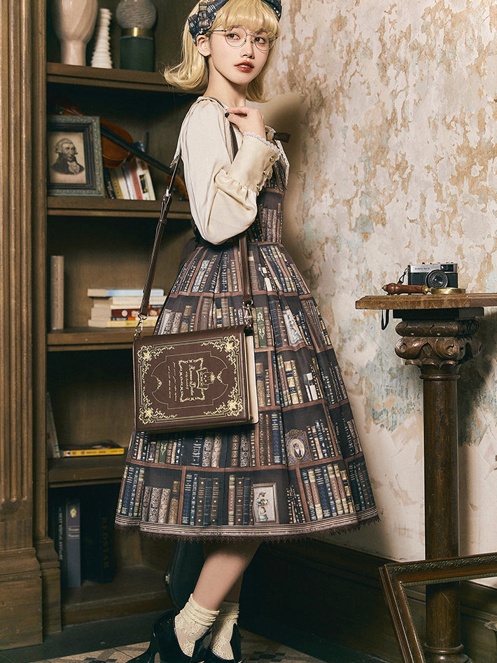 洋書の本棚のジャンパースカートとワンピースと刺繍セーラーブラウス