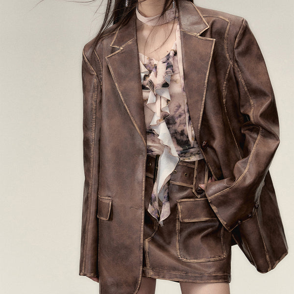 Blown leather big silhouette jacket and short skirt