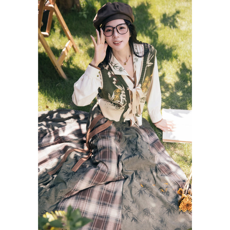 植物文様のニットベストとブラウスとスカート