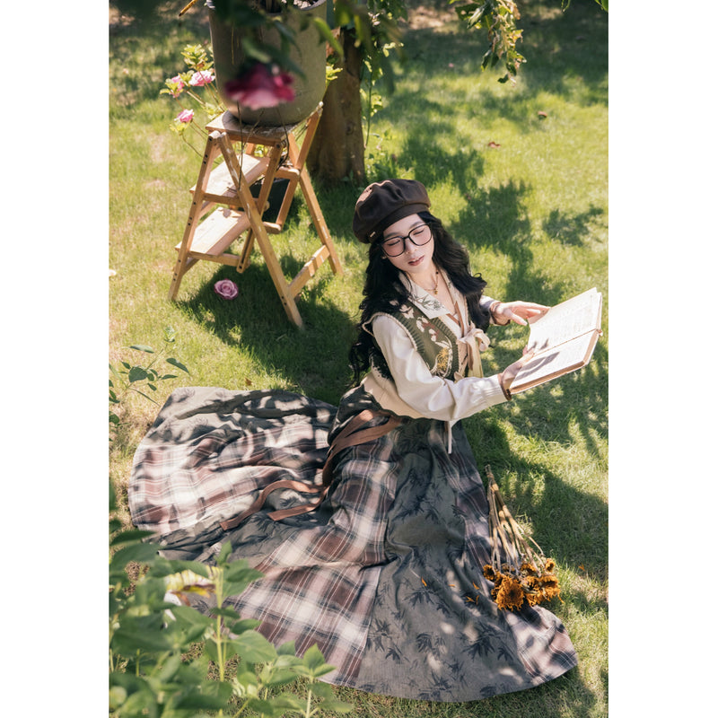 植物文様のニットベストとブラウスとスカート