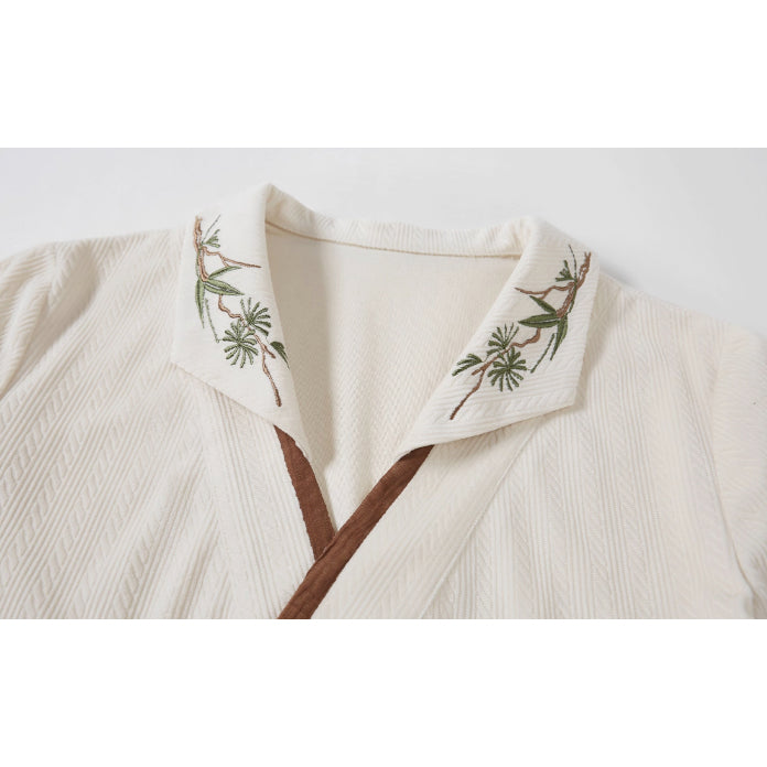 植物文様のニットベストとブラウスとスカート