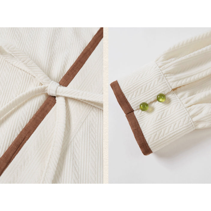 植物文様のニットベストとブラウスとスカート