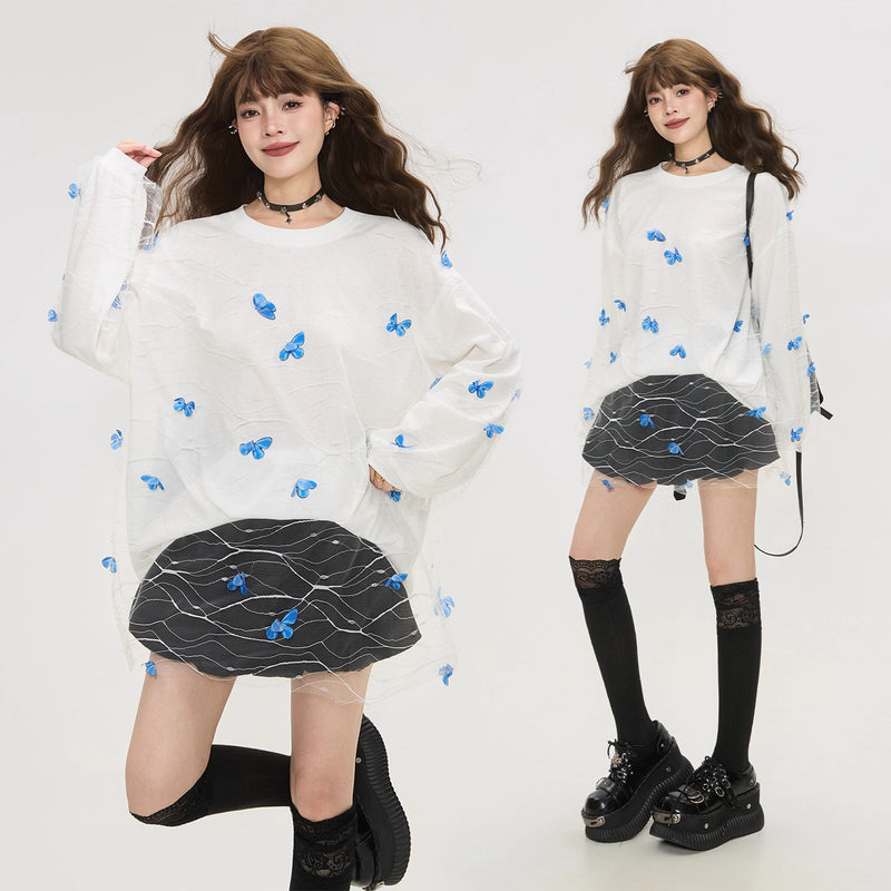白昼の蝶の刺繍トップス