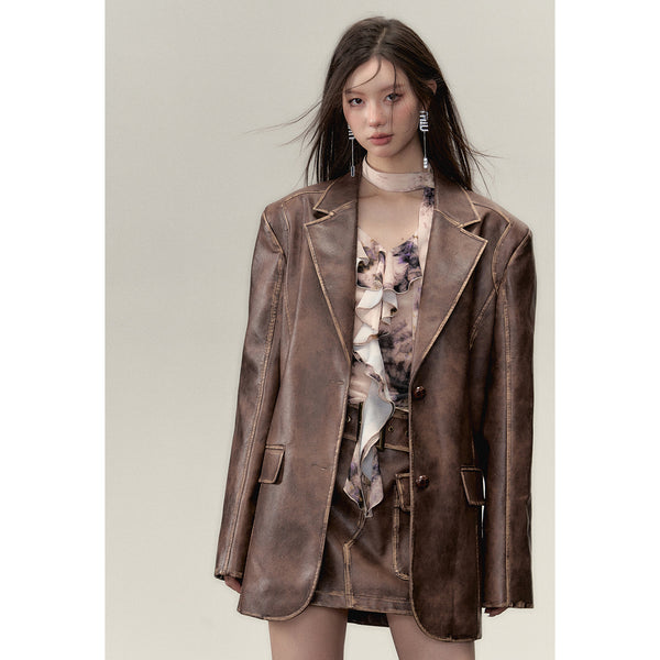 Blown leather big silhouette jacket and short skirt