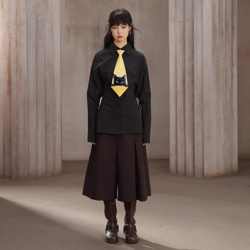 焦茶色のプリーツパンツスカート