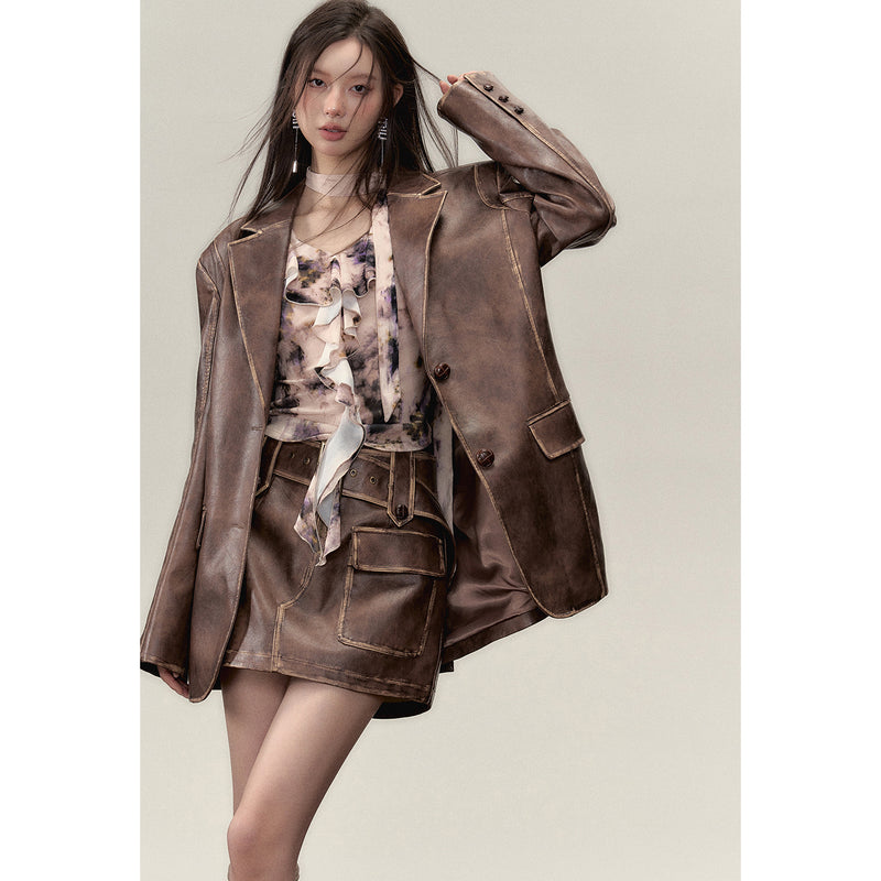 Blown leather big silhouette jacket and short skirt