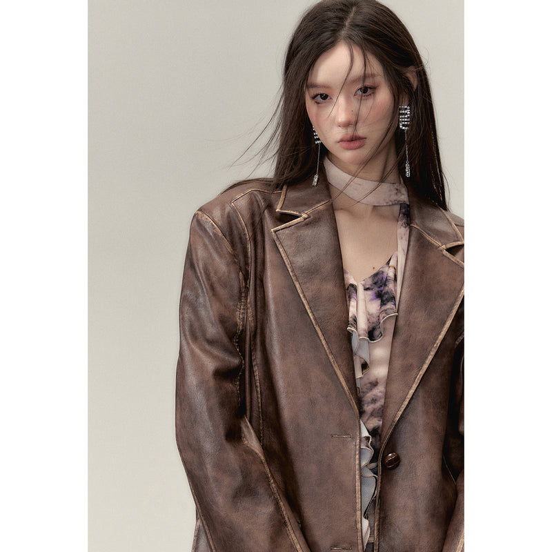 Blown leather big silhouette jacket and short skirt