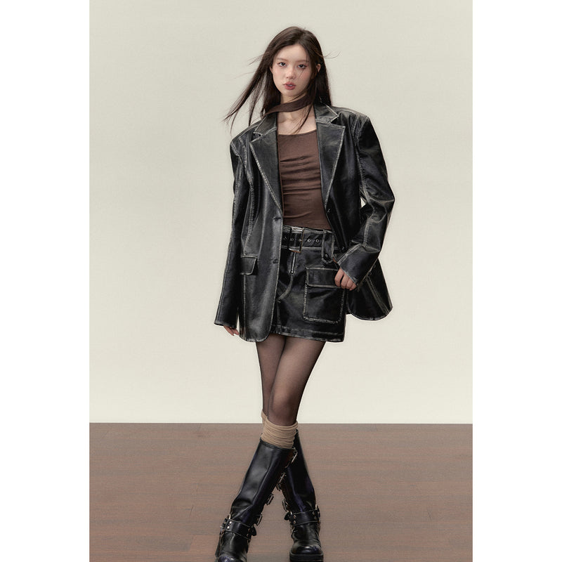 Black leather big silhouette jacket and short skirt