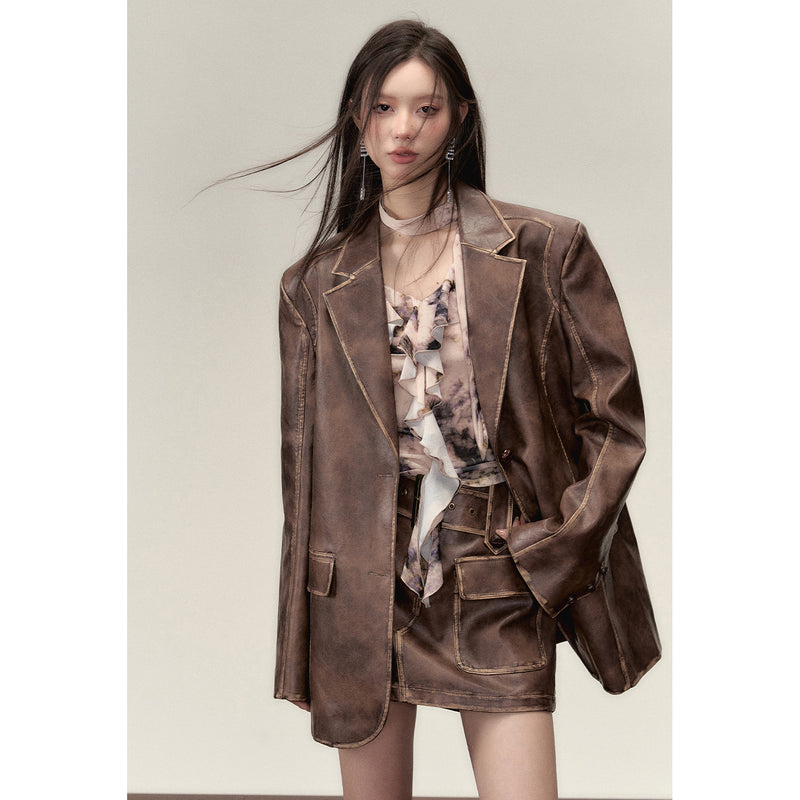 Blown leather big silhouette jacket and short skirt