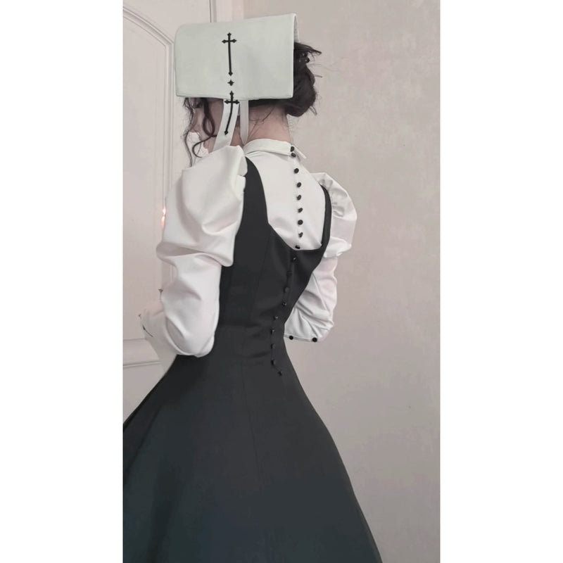 十字架と修道女のブラウス