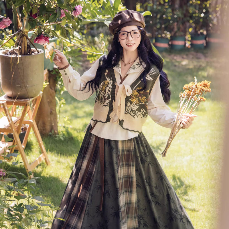 植物文様のニットベストとブラウスとスカート