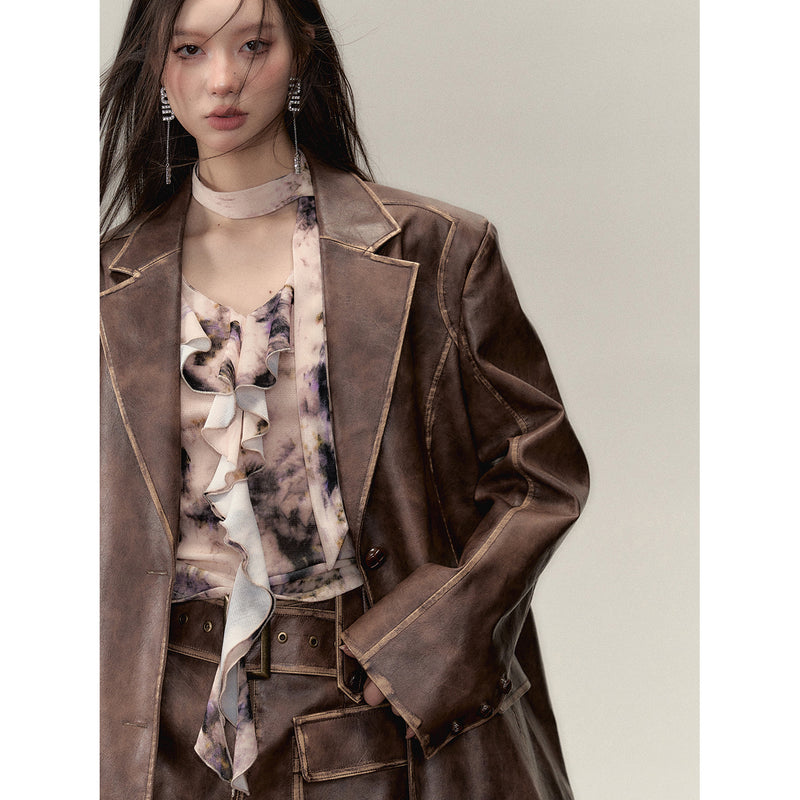 Blown leather big silhouette jacket and short skirt