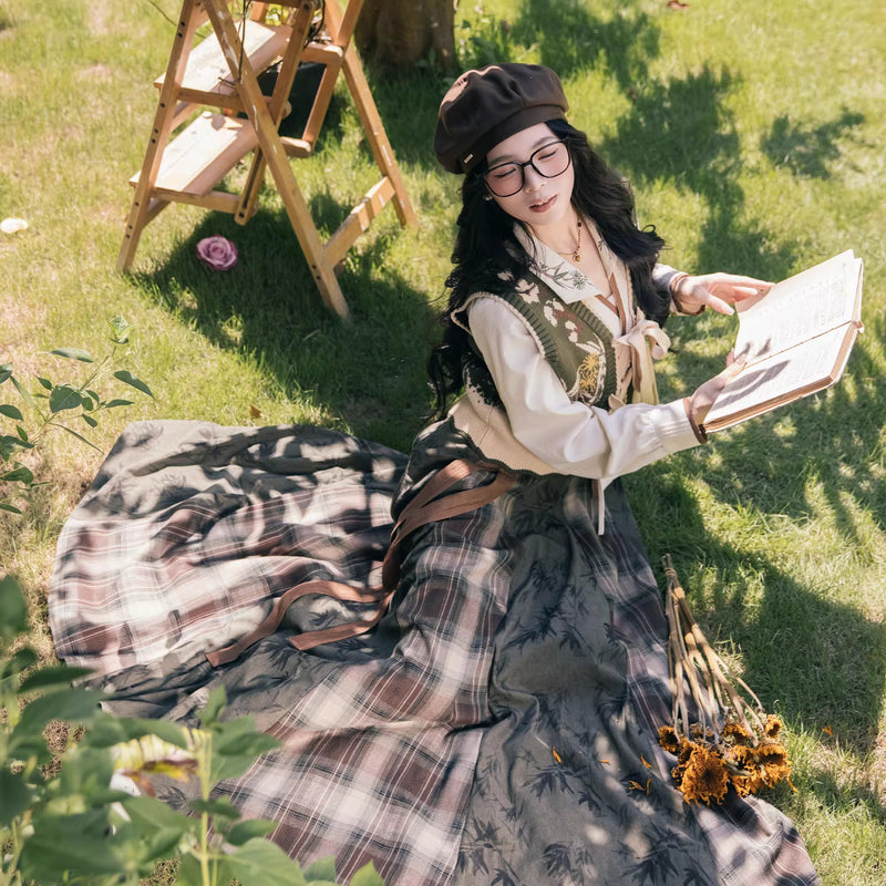 植物文様のニットベストとブラウスとスカート