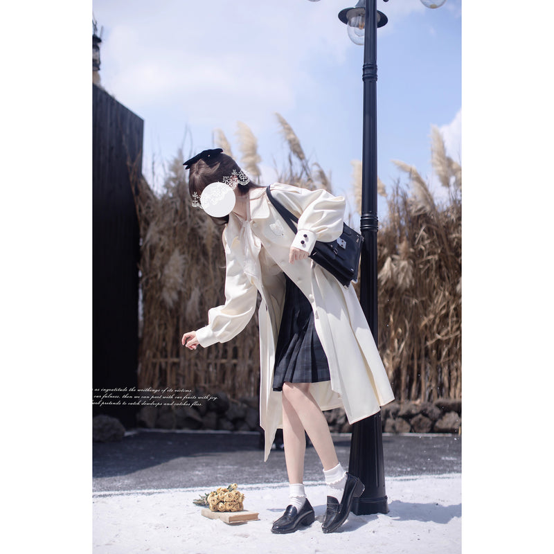 西洋のお嬢様のケープトレンチコート