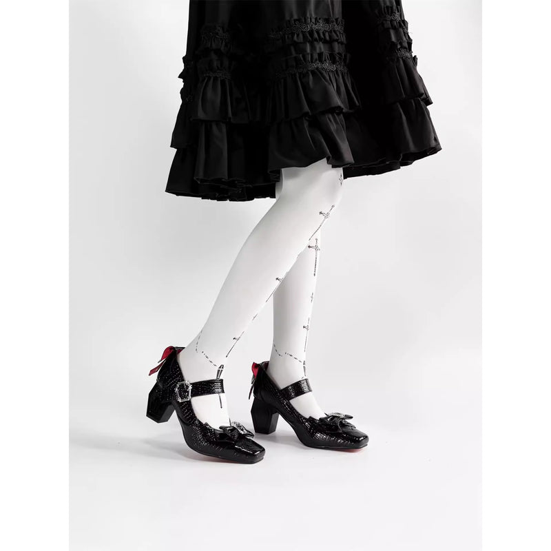 十字架の棺桶ヒールパンプス