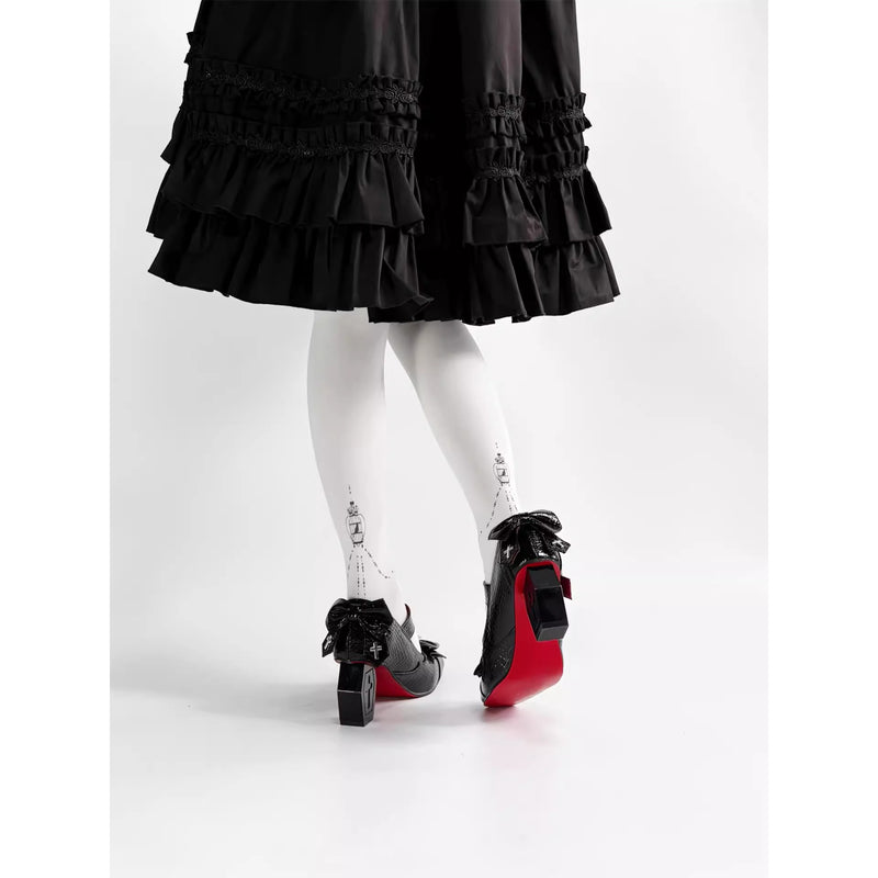 十字架の棺桶ヒールパンプス