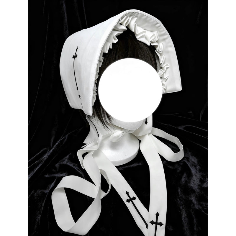 十字架と修道女のボンネット