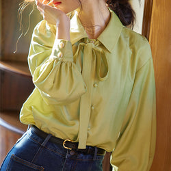 A ribbon blouse with a clear forest