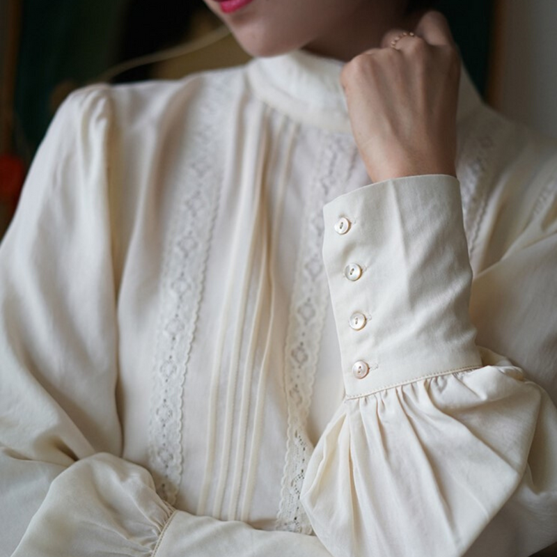 Classical blouse with embroidered decoration