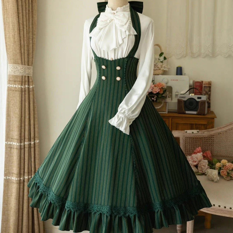 Dark green lady's vertical striped jumper skirt and high neck ribbon blouse