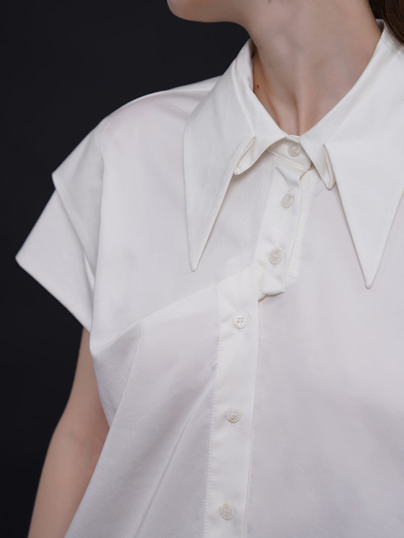 Geometric blouse with origami collar