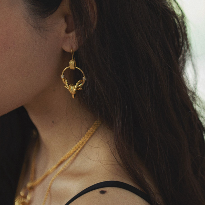gold goat earrings