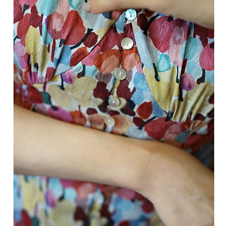 Floral pattern vintage dress with colorful tropical flowers blooming