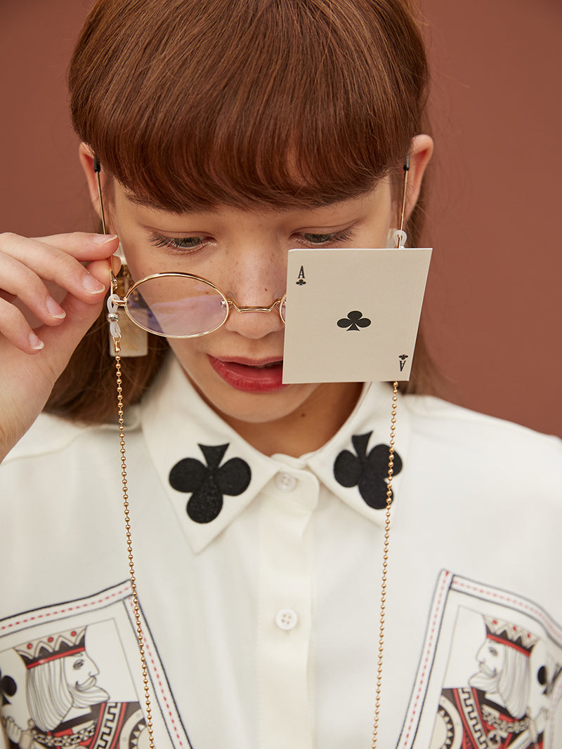 Embellished blouse with playing card pattern