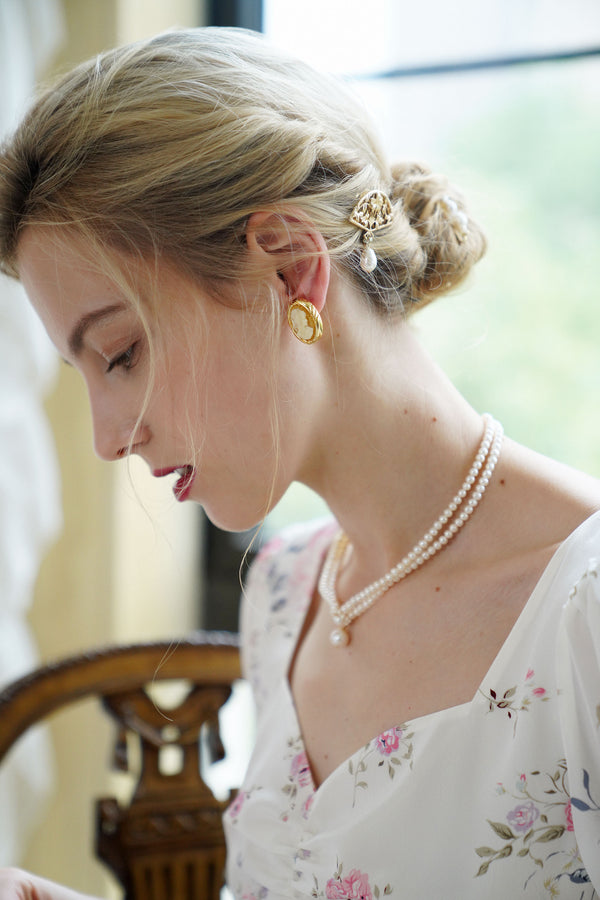 Queen portrait earrings and breastplate
