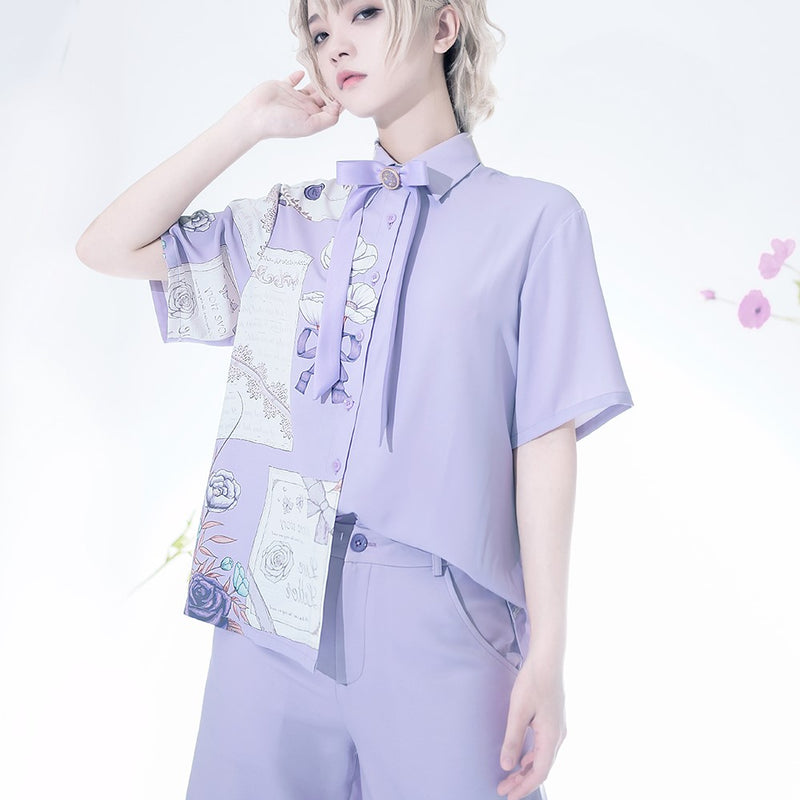 A light mauve blouse and shorts with a letter and a bouquet
