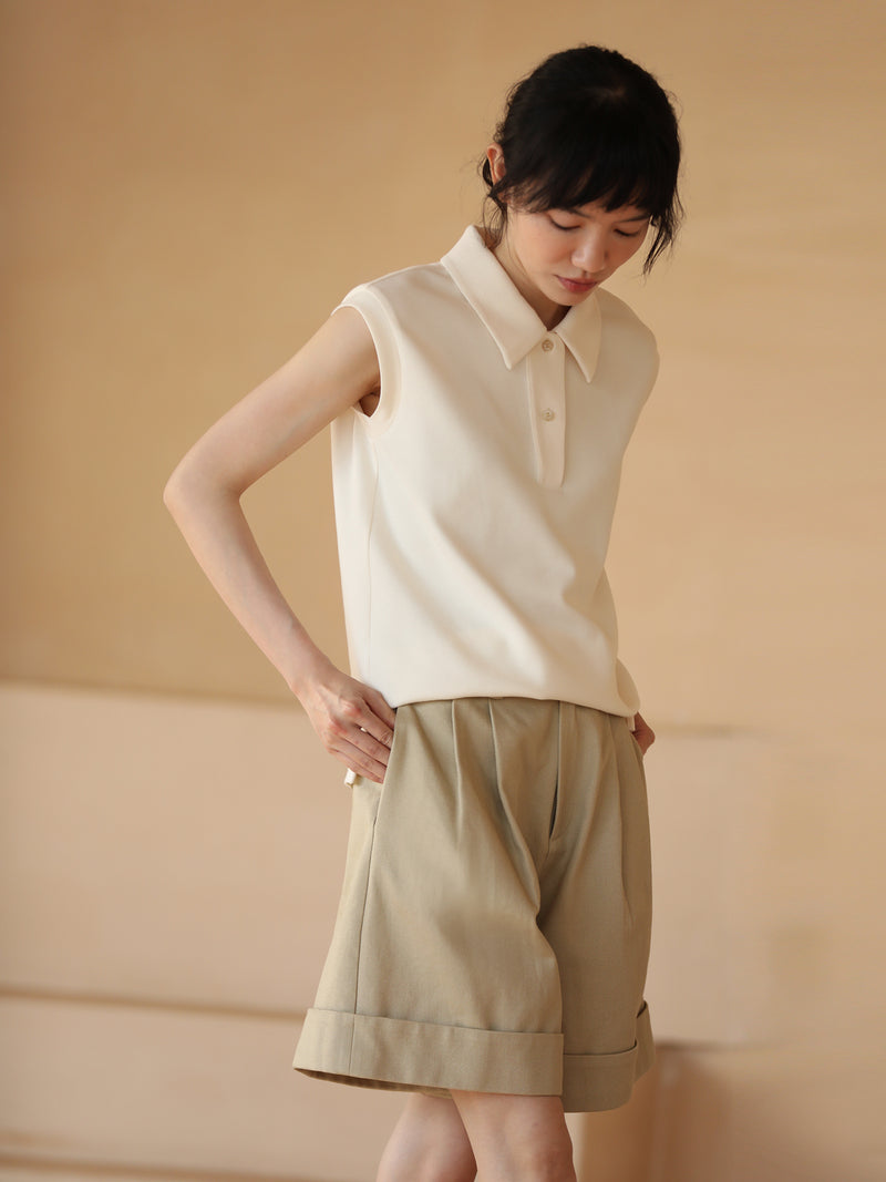 sand-colored lady sleeveless polo top