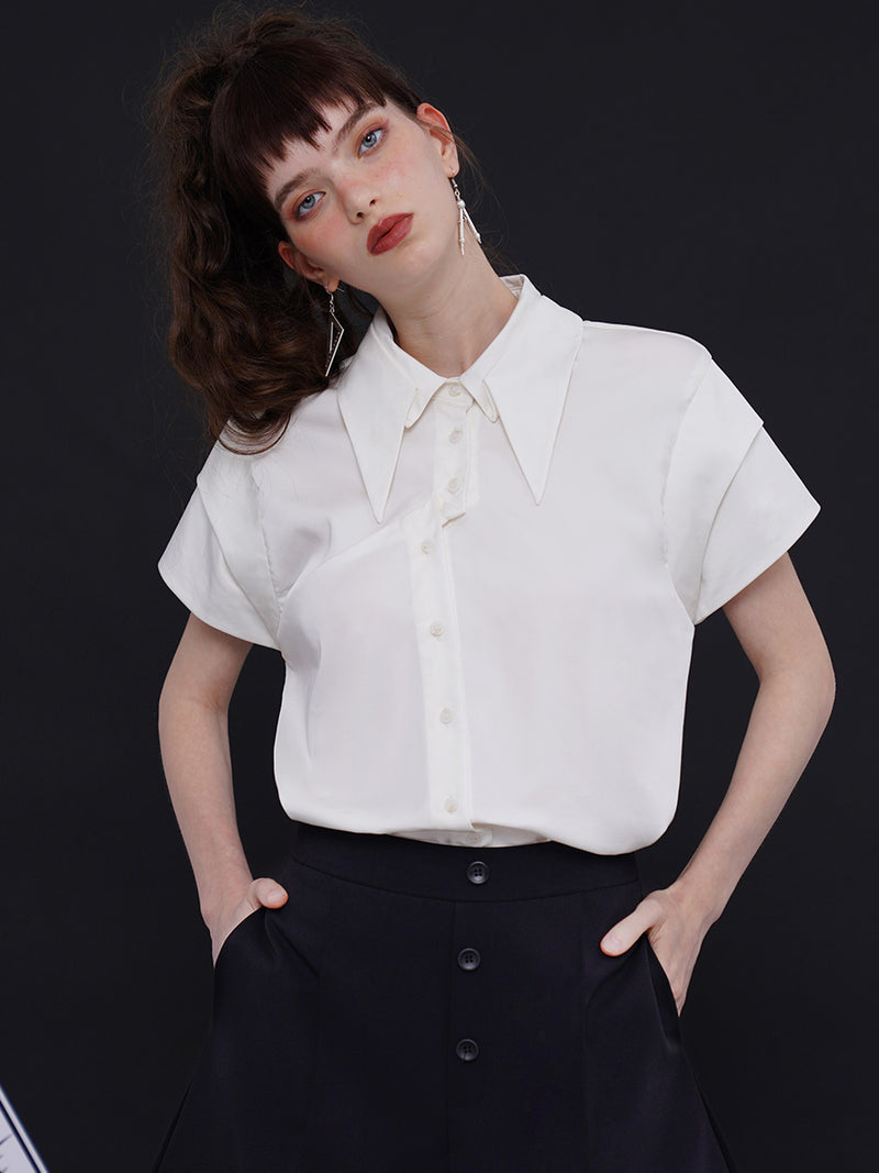 Geometric blouse with origami collar