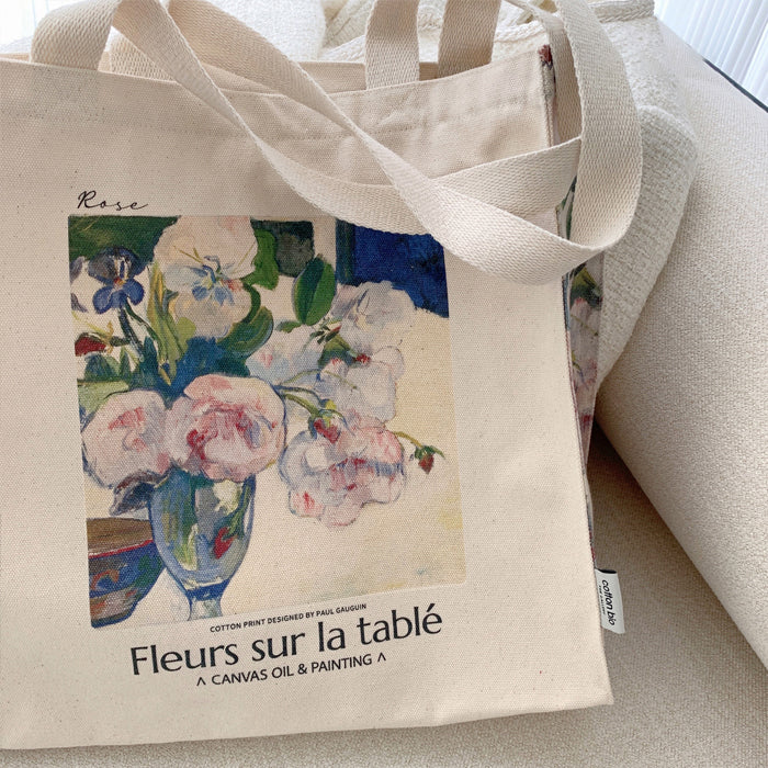 Flowers and a Bowl of Fruit on a TableTote Bag