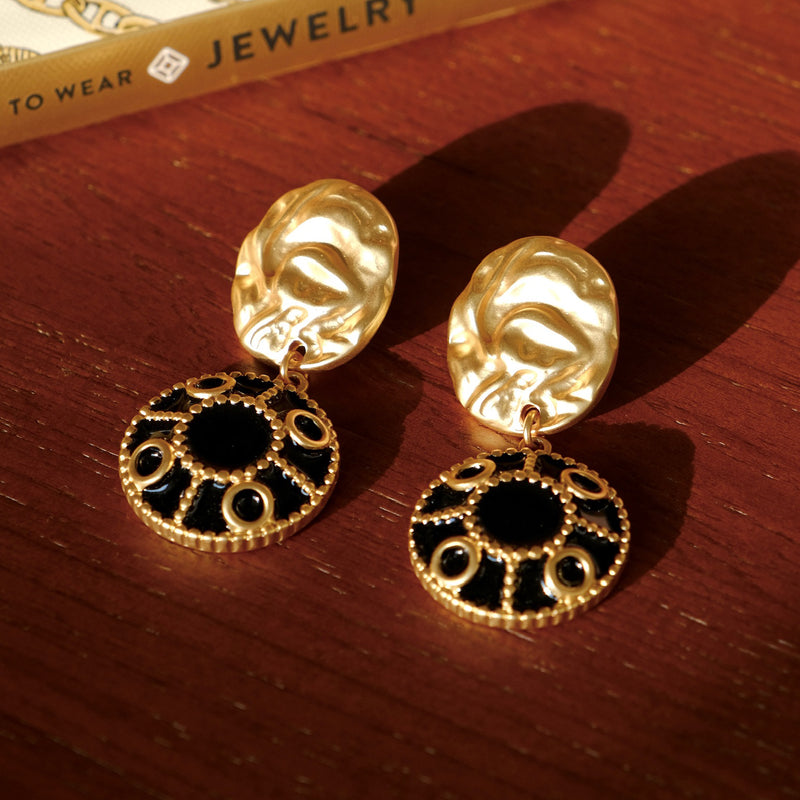 golden black witch earrings