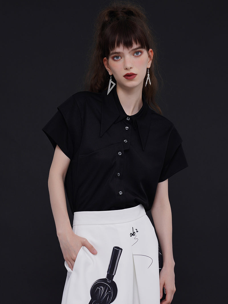 Geometric blouse with origami collar