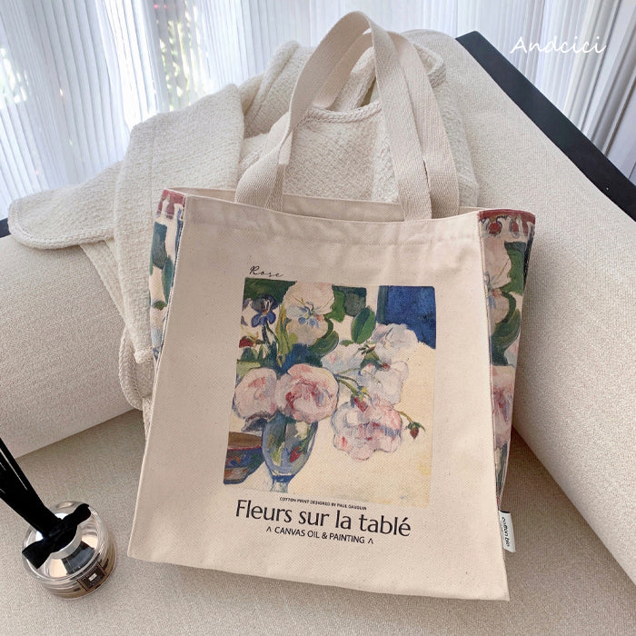Flowers and a Bowl of Fruit on a TableTote Bag
