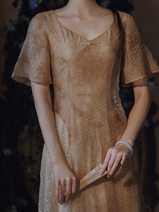 An embroidered China dress blurred in dry color