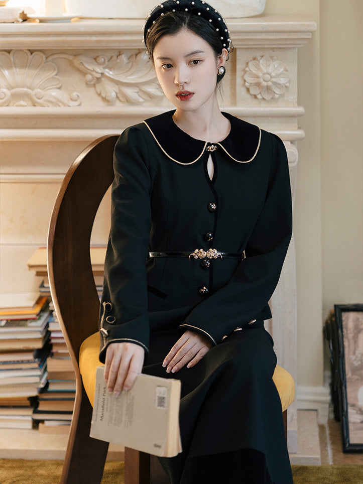 Black lady's classic jacket and long skirt 