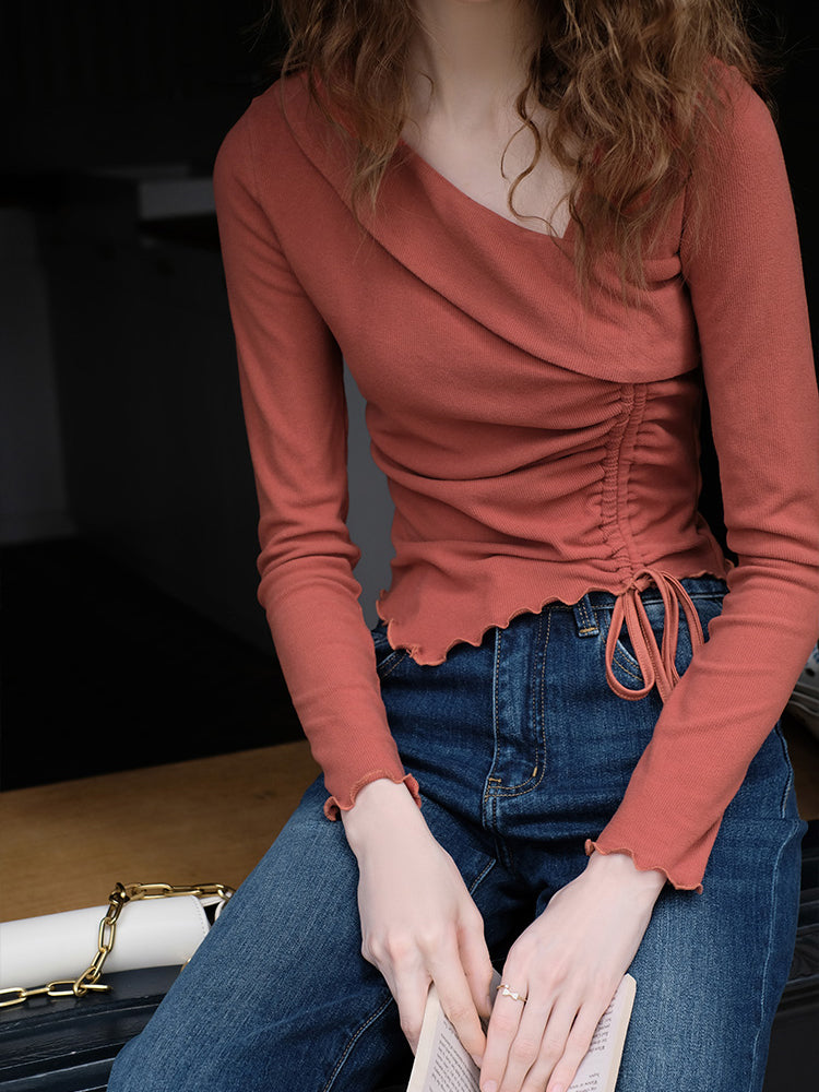 Coral-colored lady's slim top