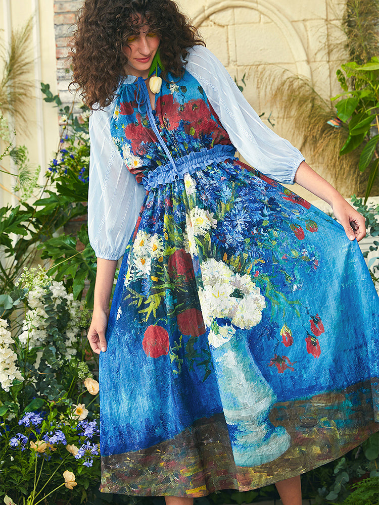 Long dress with daisies and poppies in a vase and cornflowers and poppies in a vase