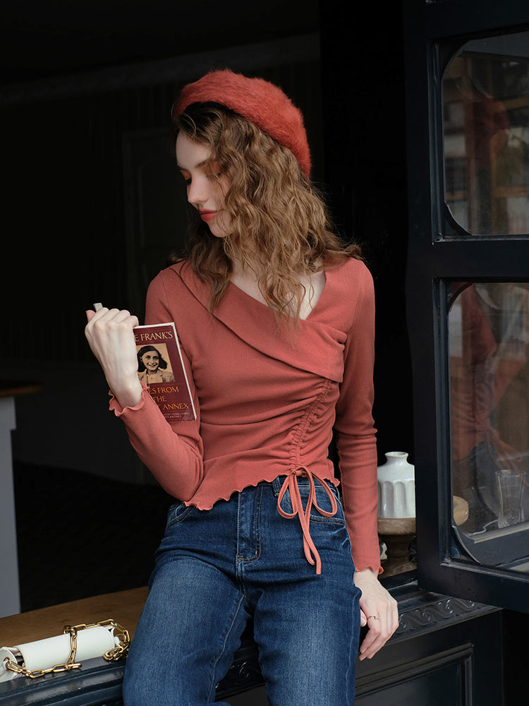 Coral-colored lady's slim top