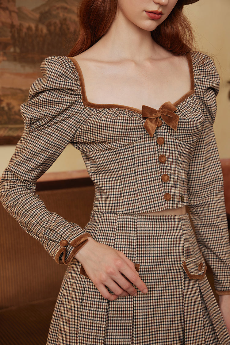Queen's plaid top and pleated skirt