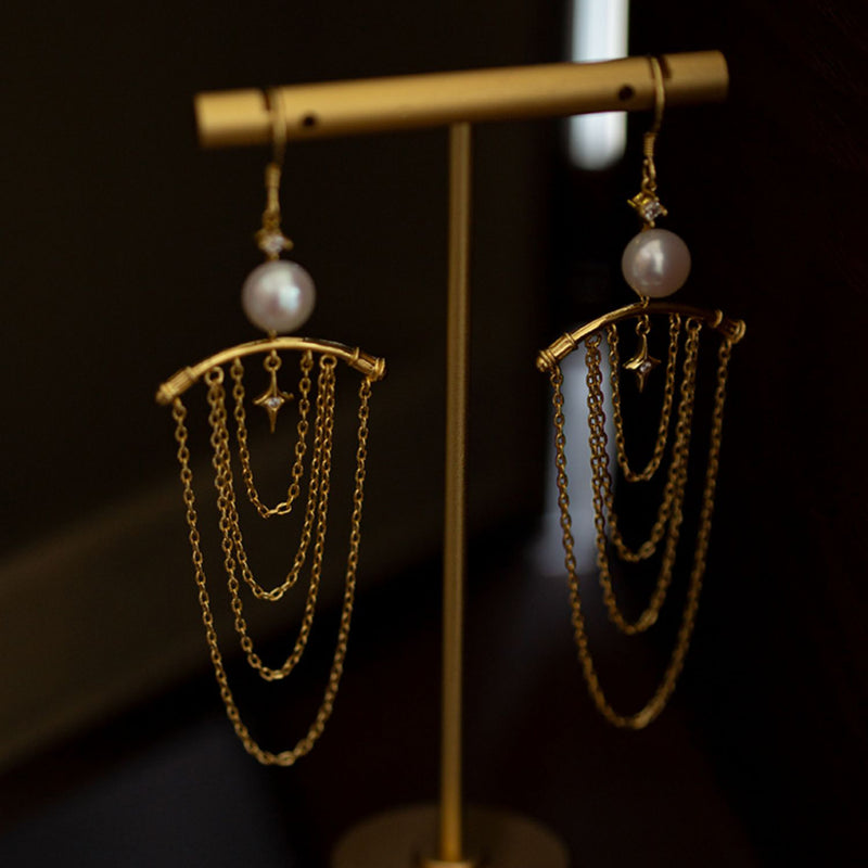 golden string earrings