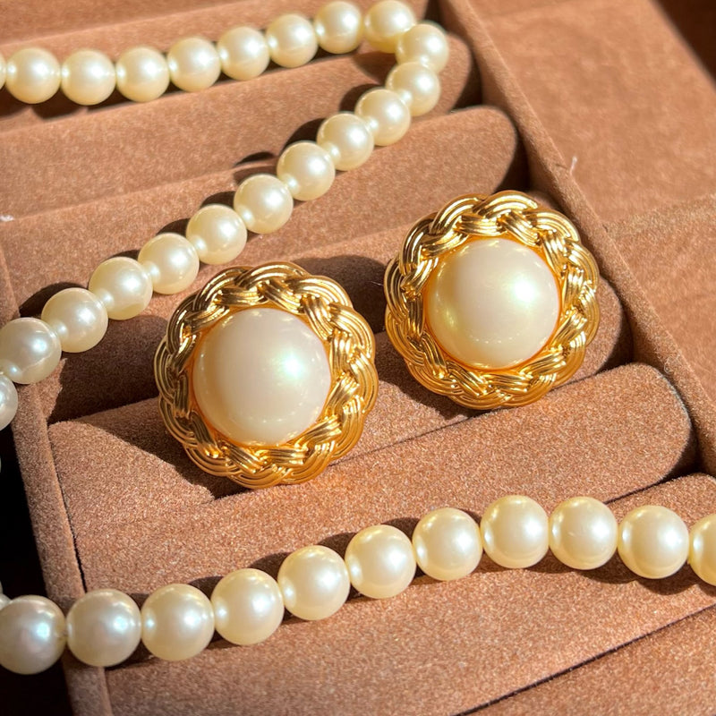 golden braid and pearl earrings