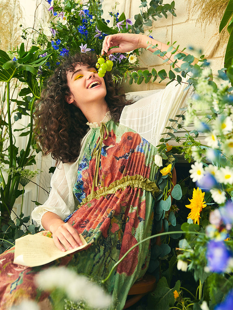 Long dress with daisies and poppies in a vase and cornflowers and poppies in a vase
