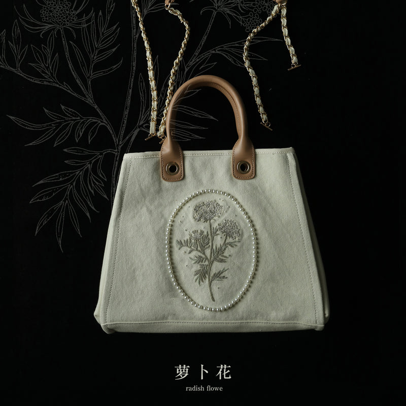 Embroidered pressed flower canvas tote bag