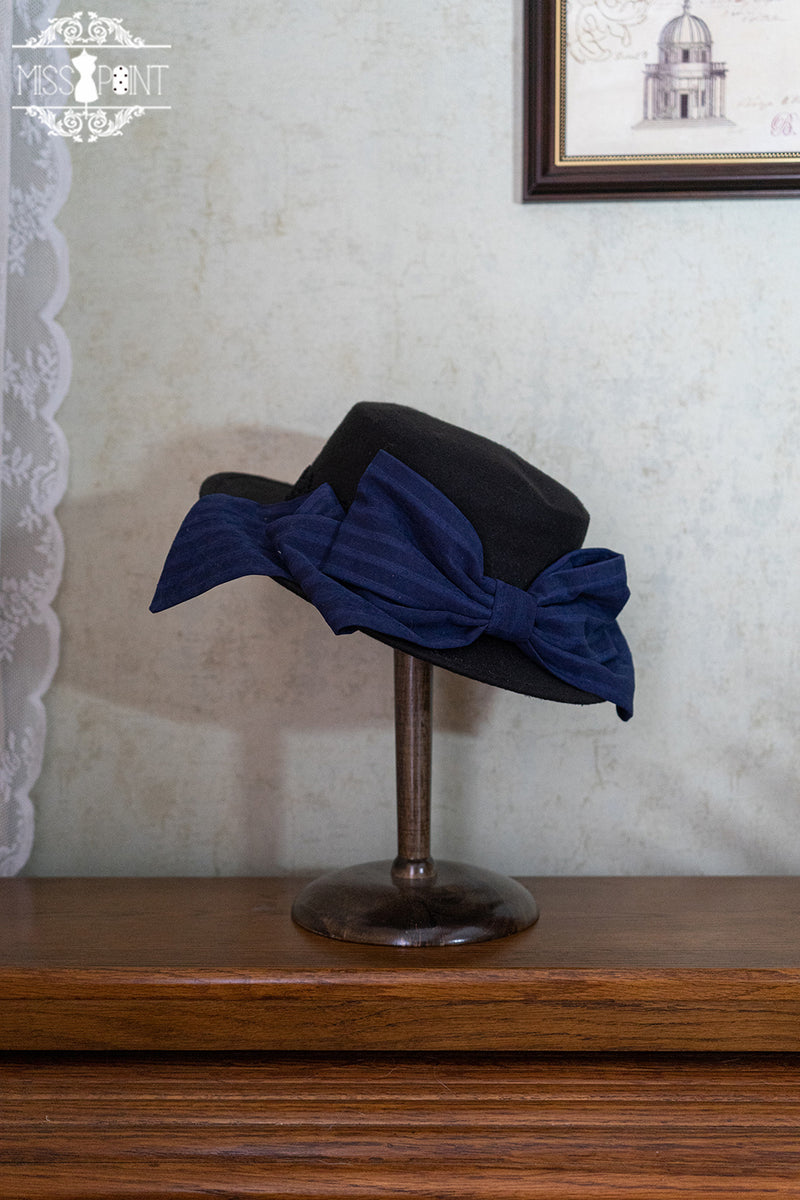 English lady's ribbon hat, beret, headband, cross necklace and lace veil
