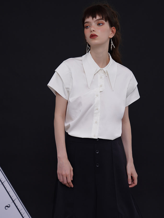 Geometric blouse with origami collar