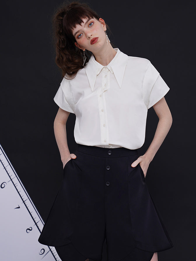 Geometric blouse with origami collar