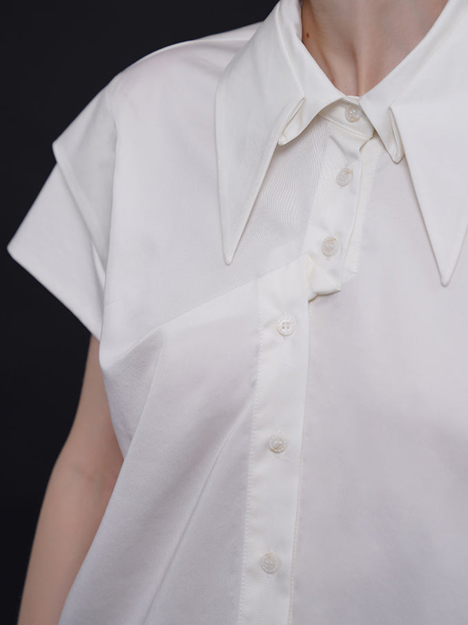Geometric blouse with origami collar